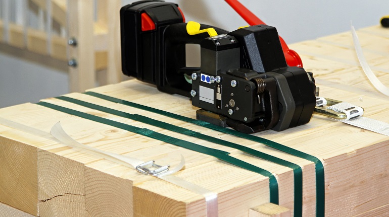 strapping machine on strapped wood