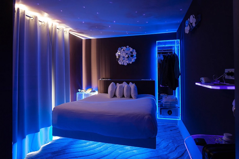 bedroom with blue led strip lighting ambient