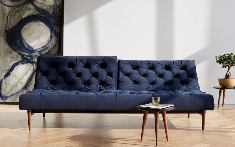 modern blue sofa for two and wooden coffe table for living room